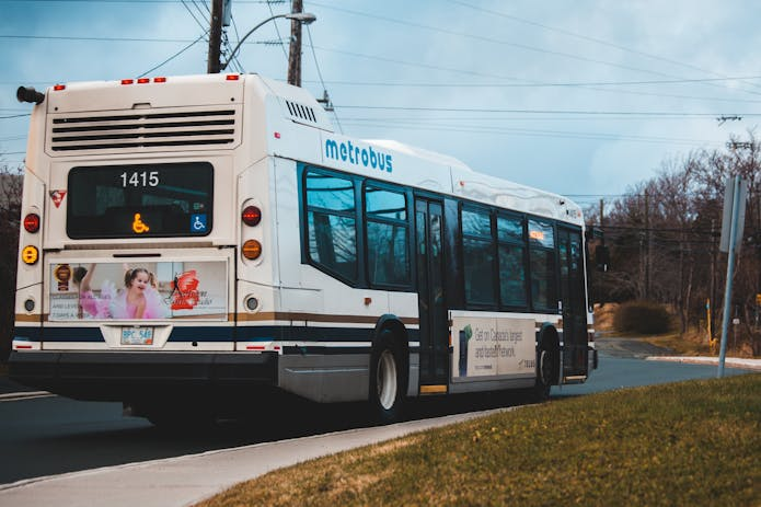 A man driving a bus at night, representing the need for a bus accident lawyer near Memphis.