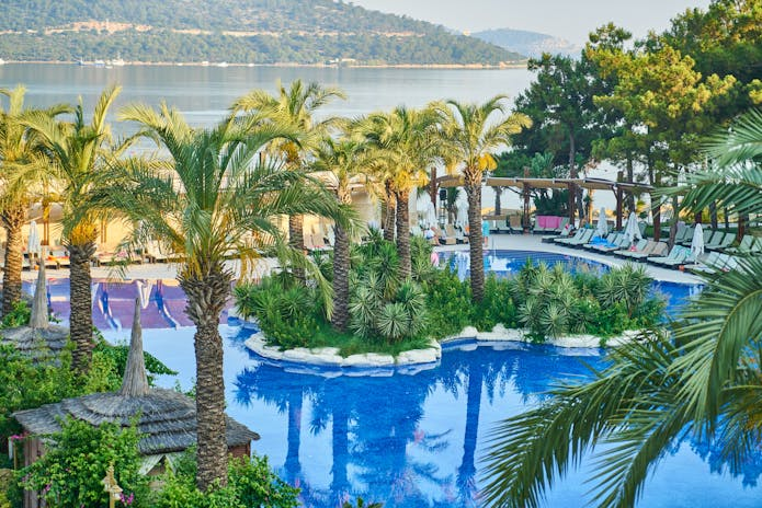 Serene pool and beach landscape at Lemon Resort Spa in Poland.