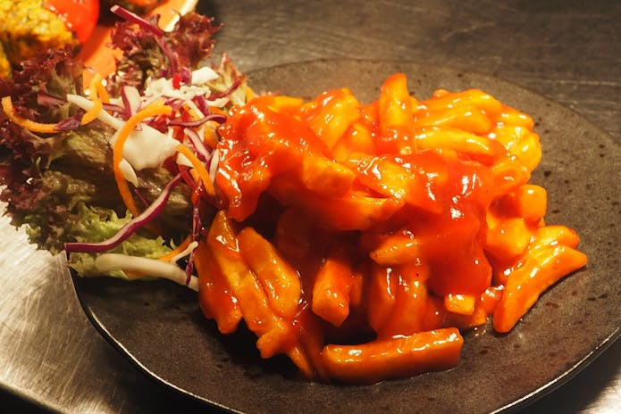 Vegetarian dish with sauce and veggies at Le Botaniste chilis Restaurants in New York.